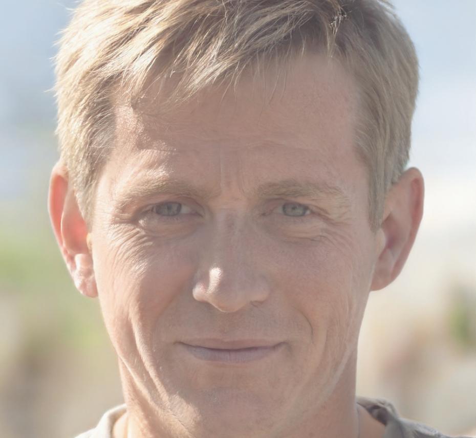 Financial education participant reviewing course materials